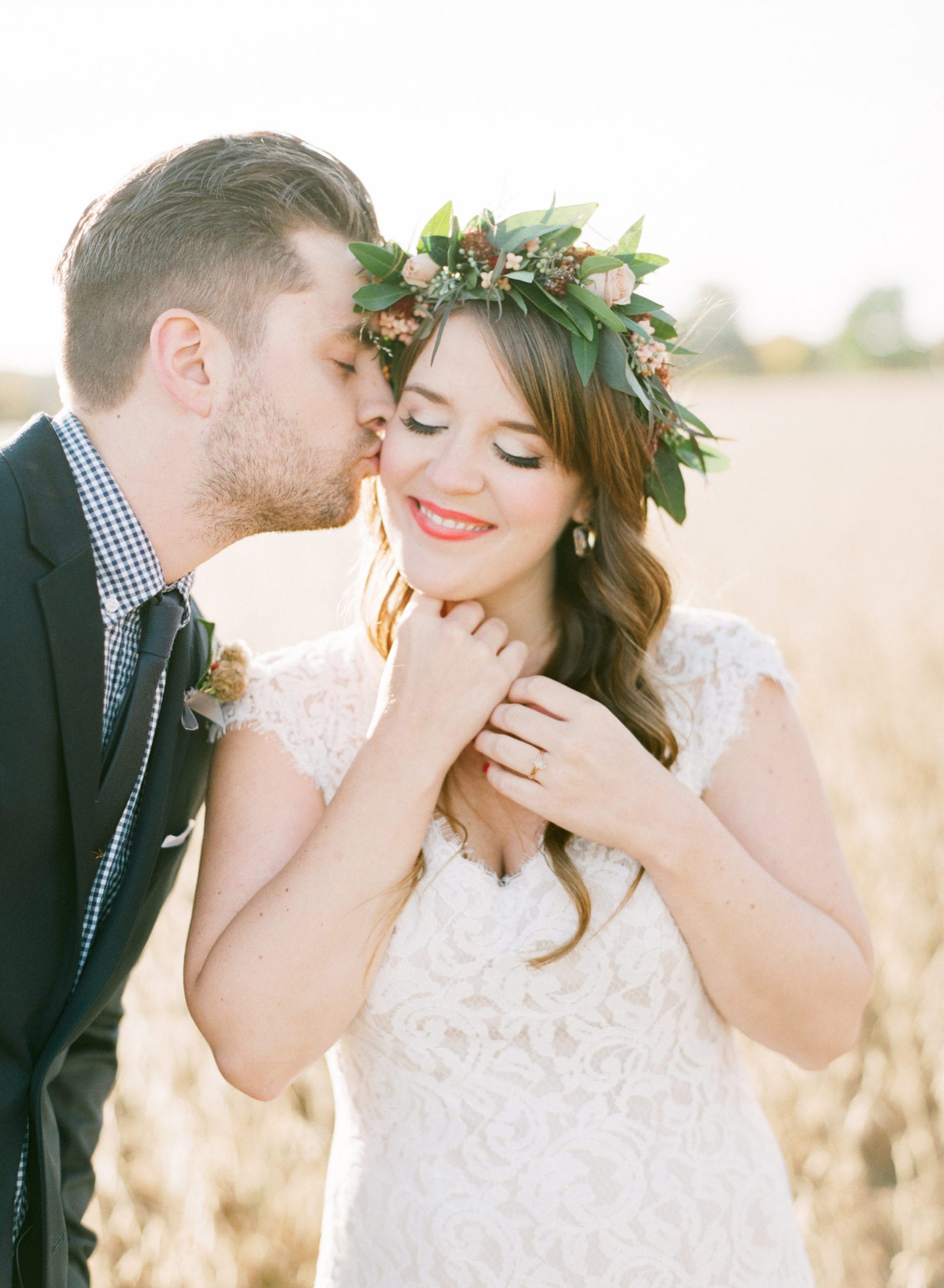 groom and bride with floral crown