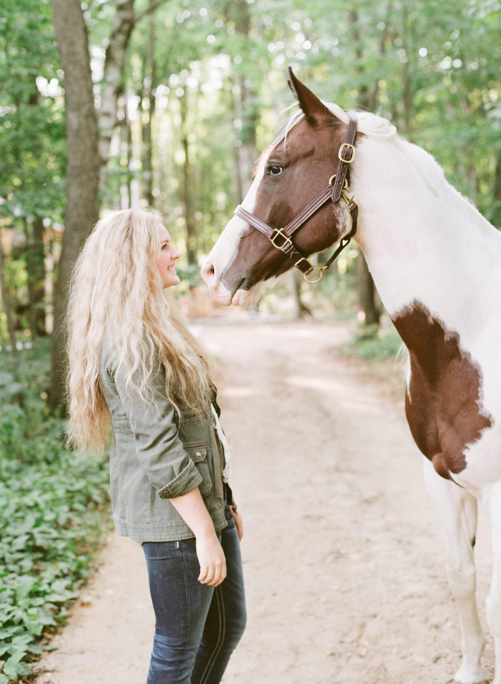 girl and horse for high school senior portraits
